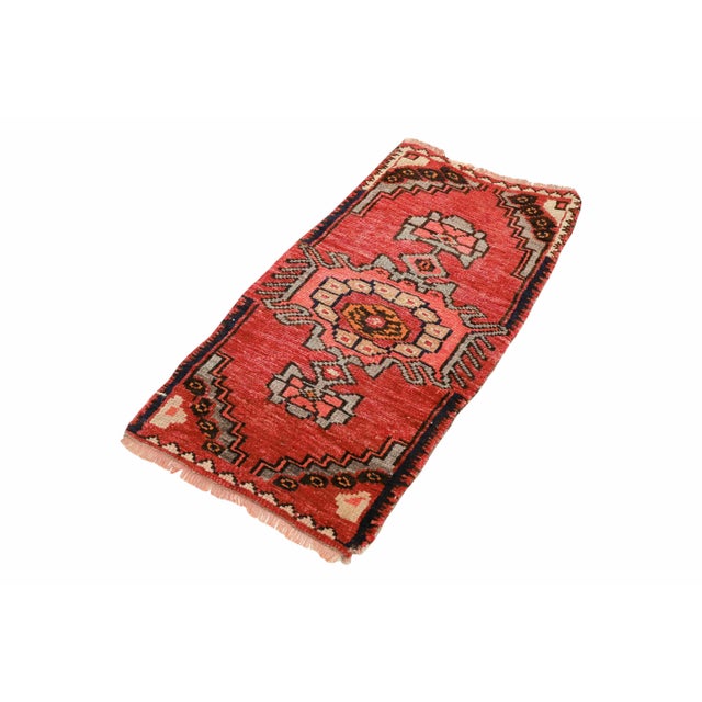 Vintage Handknotted decorative mini rug from Kars region of Turkey. Approximately 45-55 years old. In very good condition.