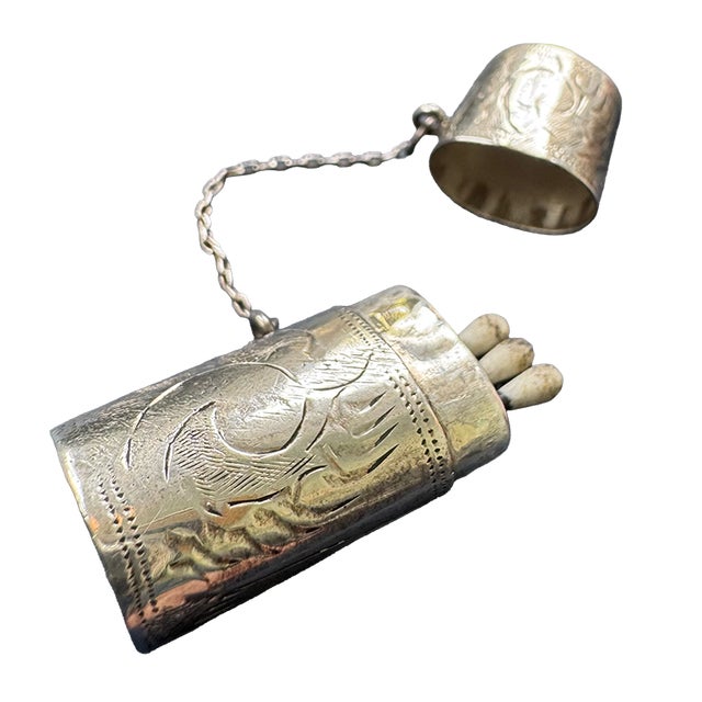 Presenting a very rare and unusual antique sterling silver cylindrical "vesta" (named for the Roman goddess of the fire...