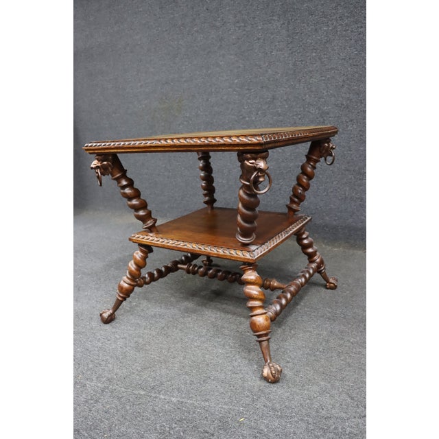 Merklin Brothers attributed quarter sawn oak side table featuring bold barley twist supports, carved rope-edge molding,...