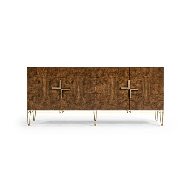 Crafted from rich walnut burl veneers, this sideboard showcases the beauty of natural wood patterns. The stainless-steel...