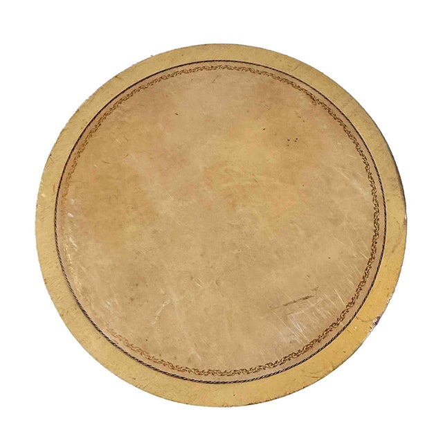 Vintage French Provincial drum table with stenciled and painted detail. Top of table has embossed leather. Casters on legs.