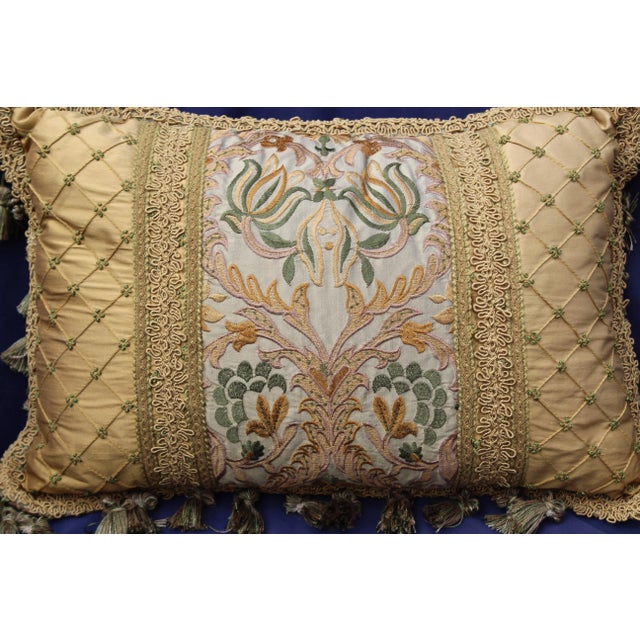 This is a 19th century Italian chair cushion with antique fabric.