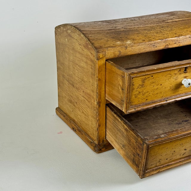 Early 20th Century Antique Wooden Two Drawer Tabletop Cabinet With Dome Treasure Chest Top in Golden Brown For Sale - Image 5 of 16