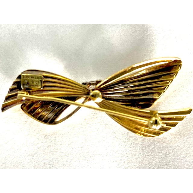 Contemporary Vintage Tiffany and Co. 14k Yellow Gold Diamond Bow Love Knot Brooch For Sale - Image 3 of 7