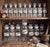 A collection of sixteen early 20th-century apothecary jars by Whitall Tatum Company of Millville, New Jersey, one of...