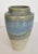 Beautiful handmade stoneware vase with aqua and sand color drip glaze. The vase has a nice classical form and shape, and...