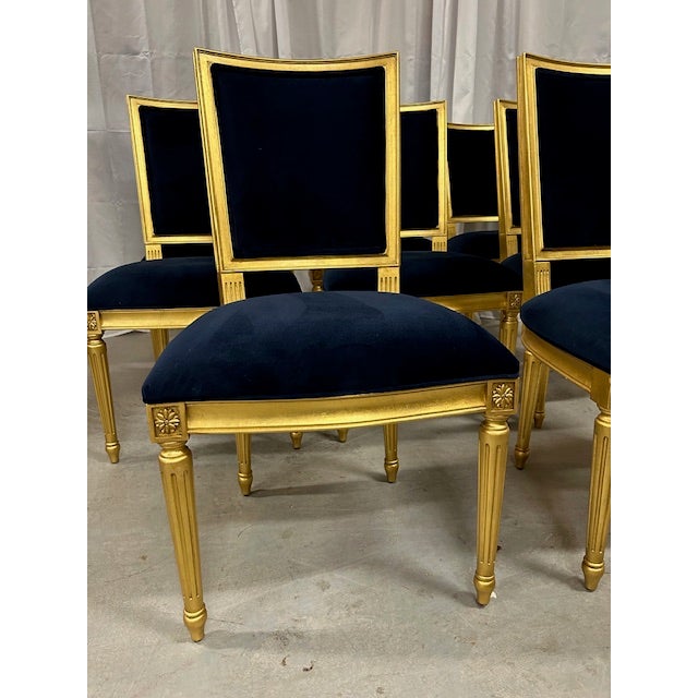Beautiful set of 8 Louis XVI Style Ethan Allen chairs designer finished in navy and gold gilded ready to surround your...