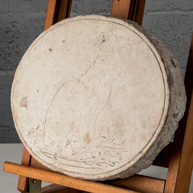 This oval lithographic proof on stone, dating from the first half of the 20th century, bears witness to the refined...