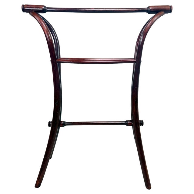 Rare No.101 "Mute Servant" by Thonet is a classic example of the famous bentwood technique developed by designer and...