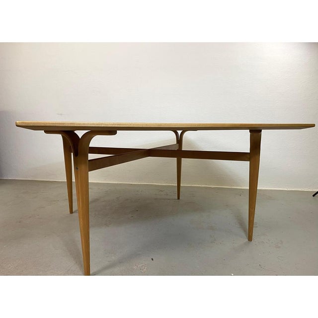 1960s Cleft-Leg side table in ash wood by Bruno Mathsson Large Bruno Mathsson’s square sized “cleft-leg” table originally...