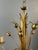 A superb Italian gilt metal chandelier with six lights, featuring an elegant floral motif typical of 1950s Italian design....