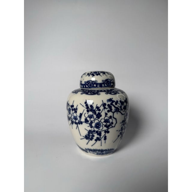 Inherent natural features from Japanese culture of cherry blossoms and scrollwork adorn the body of this Asian inspired...