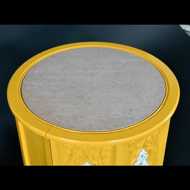 Matching pair of round vintage 1970s Mediterranean end tables. These side tables have been restored and restyled with...