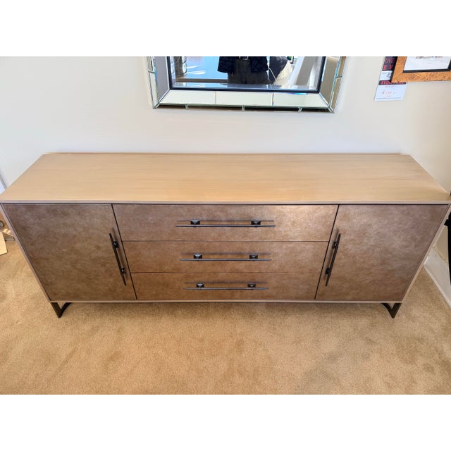 A sophisticated Caracole sideboard that blends clean modern lines with the brand’s signature touch of glamour. Finished in...