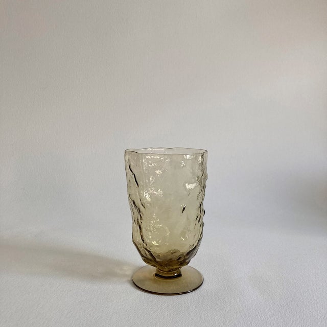 A set of 4 Morgantown drink glasses in the Crinkle pattern in the Amber colorway. This is a beautiful set of biomorphic...