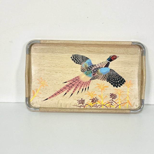 This is a Cerused Oak wooden tray from the 1960s with metal corners and slotted side handles. The design is a hand-painted...