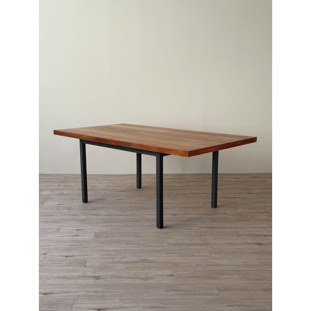 Mid-century modern extension dining table designed by Milo Baughman for Dillingham. The rectangular top features...