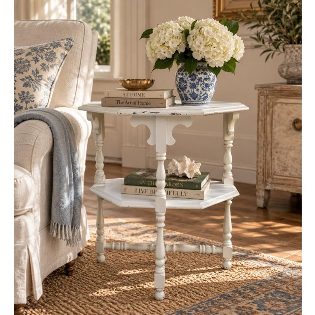 A handsome Victorian side table crafted in walnut and painted in antiqued white. The elegant carved legs create a piece...