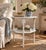A handsome Victorian side table crafted in walnut and painted in antiqued white. The elegant carved legs create a piece...