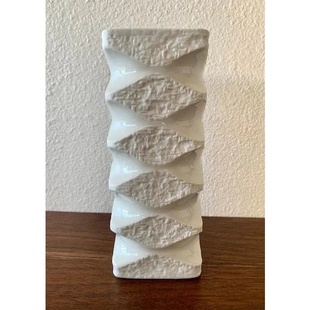 Love this design! A mix of shiny and bisque white german Porcelain in a very unique design. Most of this op art...