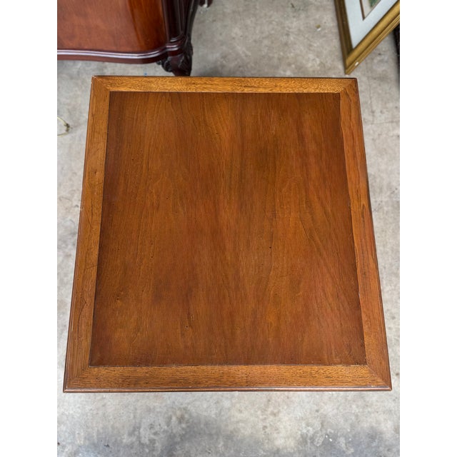 A great Henredon midcentury cross-banded Walnut Single Drawer Side Table with shelf in great vintage condition. Measures...