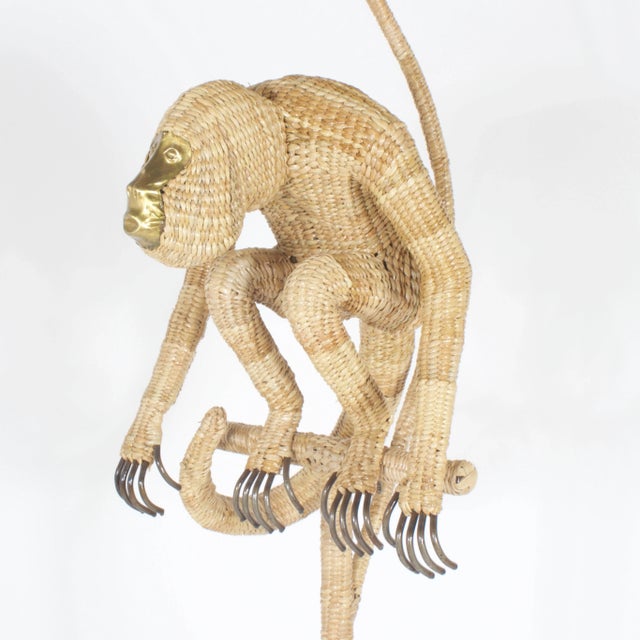 Mario Torres floor lamp constructed of a metal frame wrapped with wicker or reed in tightly woven pattern on organic...