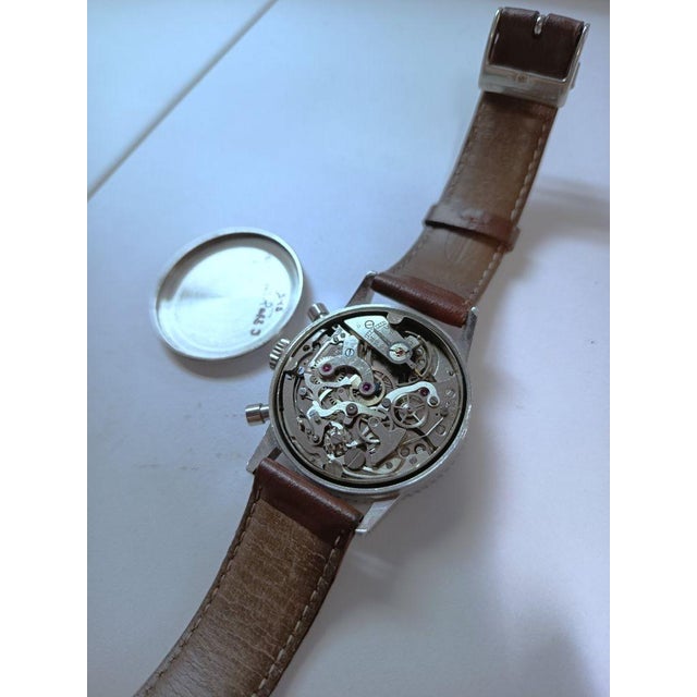 Brand: Dodane Model: Type 21 Military Chronograph Year: 1960–69 Movement: Manual-winding Movement Type: Valjoux 22 fly-...