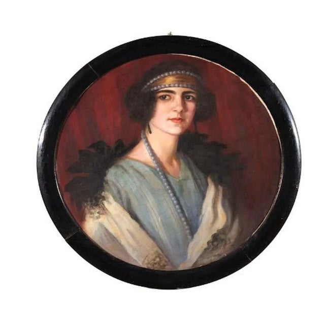 Beautiful circular oil on canvas representing the portrait of a Noblewoman dressed in Art Nouveau Style. It includes a...