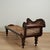 Dashing 19th century West Indies chaise lounge handcrafted in mahogany in elegant form with carved acanthus leaves, caned...