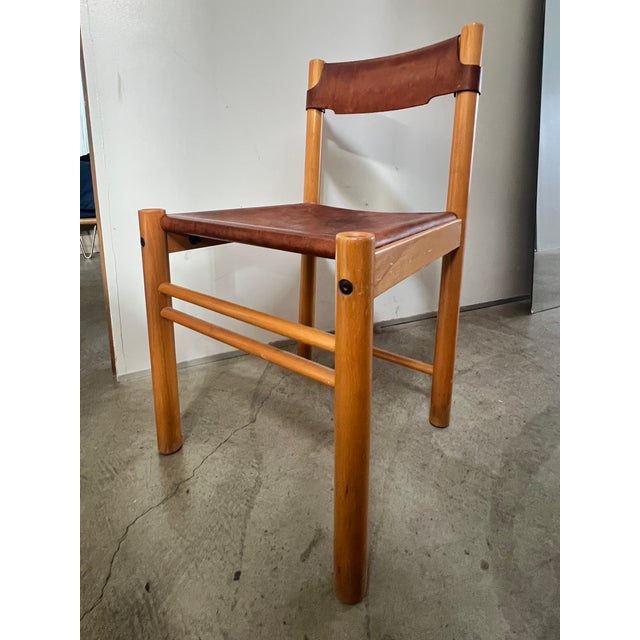 Beautiful and Rare Italian Ibisco Sedie chair with cognac saddle leather seat and backrest and beech wood frame. In good,...