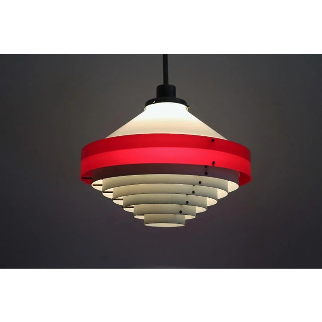 Beautiful Italian mid-century pendant lamp in Scandinavian style! Attributed to Stilnovo Italy, made in Italy in the...