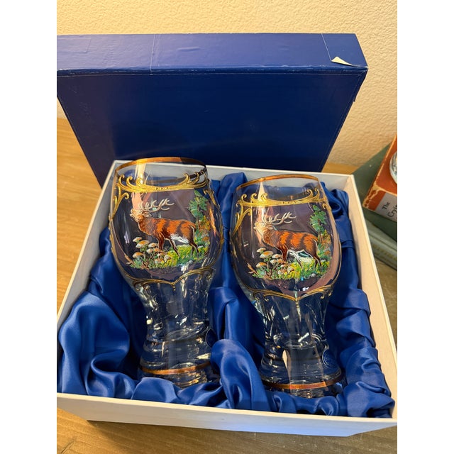 Seven inches tall heavy crust hand painted elk glasses. I excellent condition. Each set comes with a box . I would...