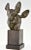 Art Deco bronze bust of two deer signed by Georges H. Laurent. Green patinated bronze on a wooden base. France, 1930. This...