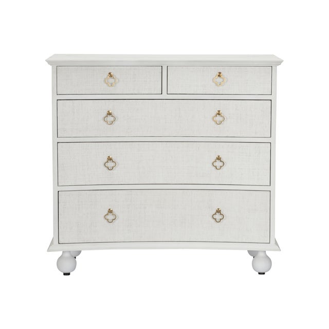 The Maxwell Chest is a stylish five-drawer piece featuring a wooden frame finished in crisp white, elevated by classic...