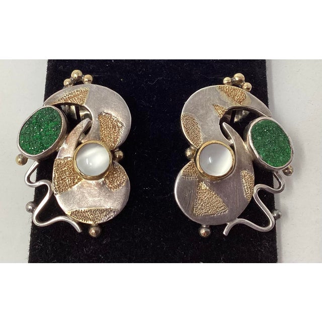 Abstract Pin/Pendant and earrings set by Tricia Young. The pin measures 3" wide by 2.75" high. The earrings measure 1"...