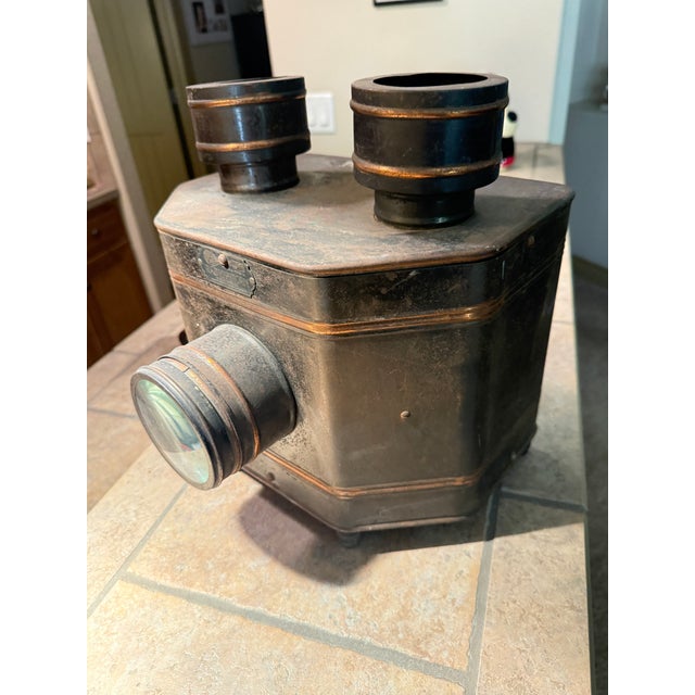 Transport your space back to the early days of home entertainment with this beautiful, early 20th century radio Optican...