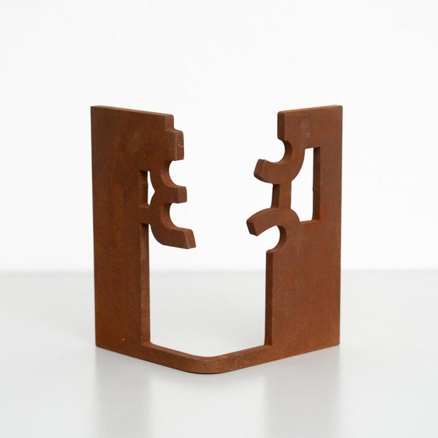 This exquisite abstract sculpture, crafted from iron, is a striking piece inspired by the bold and evocative works of...