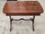 A Mid Century Regency Style Mahogany Trestle Table With Two Pull-Out Trays and Brass Cap Paw Feet Measures 40" in width x...