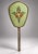 This exquisite vanity hand mirror features an elongated, shield-shaped glass pane set within a gilded brass frame with...