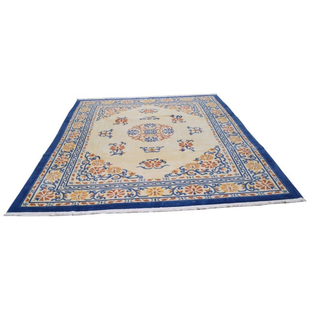 Hand-knotted with care using traditional rug-making techniques, this wool rug blends timeless craftsmanship with a modern...