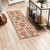 Enhance the ambiance of your home with this magnificent Persian-influenced Turkish hand-knotted rug made by skilled...