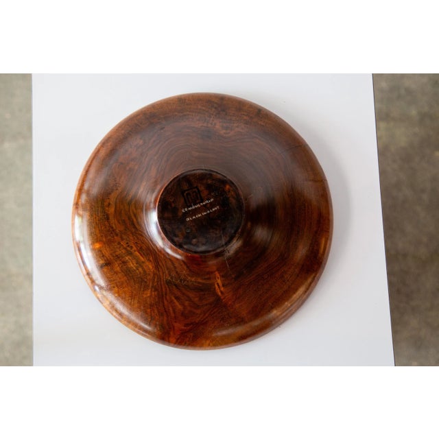 A black walnut footed turned plate by master wood turner Ed Moulthrop. A beautiful example can be used as a catch all, or...