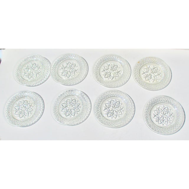 Beautiful American early 20th-century decorative pressed glass tableware. Thoroughly clean and sparkly coasters to...