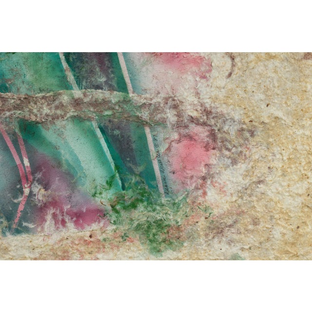 This Leanne Weissler mixed-media painting captivates with its ethereal blend of color, texture, and depth. Encased in a...