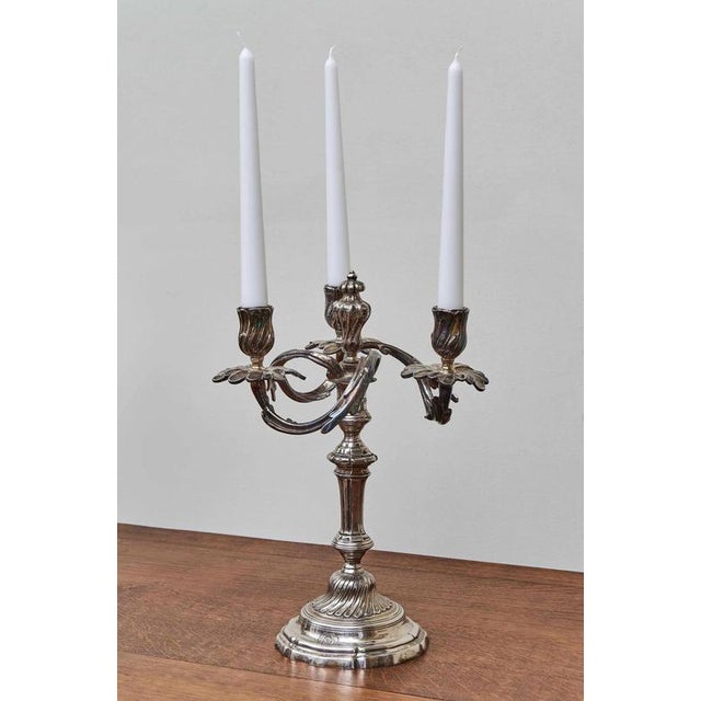 Heavy and detailed candlesticks in the style of Louis XV. The candlesticks were made in the 19th century. Each candlestick...