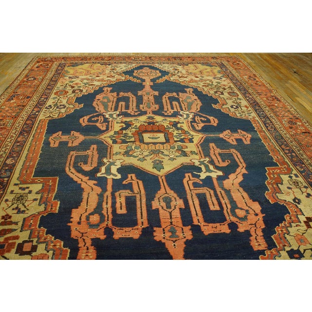 Antique Bakshaish Room Size Wool Blue Rug, Circa Date: 1870s. This exceptional example of 19th-century weaving represents...