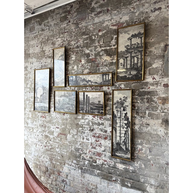 Exceptional curated set of seven framed European architectural prints depicting classical ruins, grand columns, arches,...
