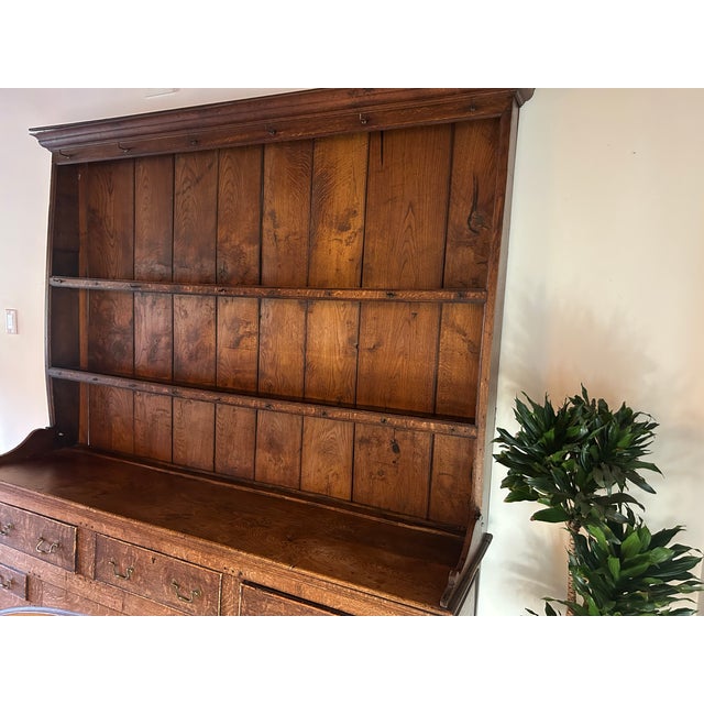 Early 18th-century (1730) English Oak Welsh Dresser with Plate Rack. Incredible value as similar pieces are currently...