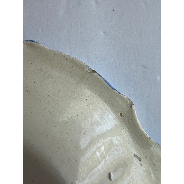 Colorful Italian Botanical Wall Plates, three ivory and blue plates with tulips and roses. A beautiful grouping to hang on...