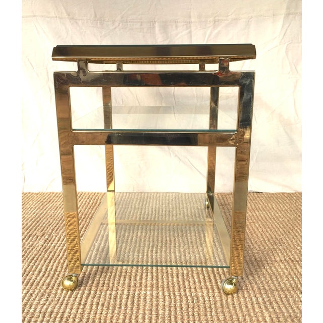Hollywood Regency A Vintage 70's Asian Style Brass Tone Bar Cart With Glass Shelves For Sale - Image 3 of 6